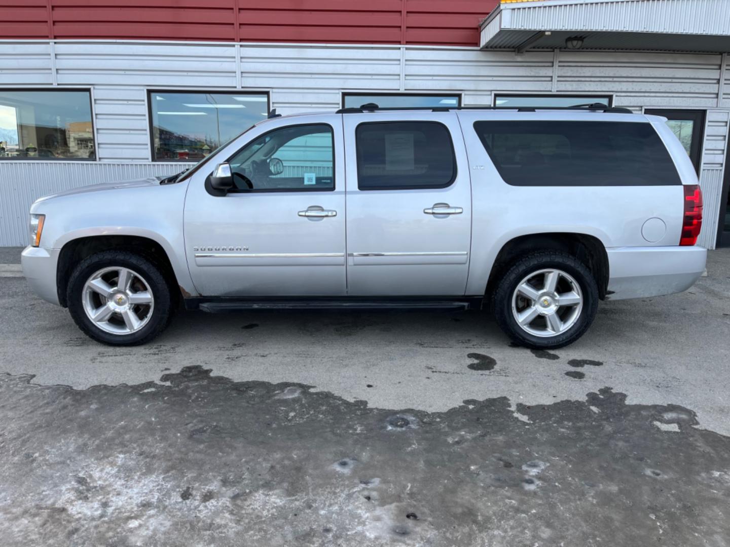 2013 SILVER /black leather CHEVROLET SUBURBAN LTZ (1GNSKKE70DR) with an 5.3L engine, Automatic transmission, located at 1960 Industrial Drive, Wasilla, 99654, (907) 274-2277, 61.573475, -149.400146 - Photo#1